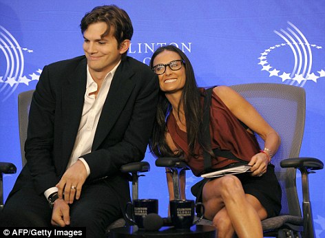 Ashton Kutcher and Demi Moore faking it for the cameras