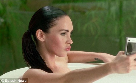 Megan Fox in Motorola ad. Fox has a condition known as "clubbed thumbs" and 