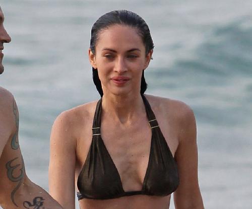 megan fox weight loss. Megan Fox Frolics Away Her