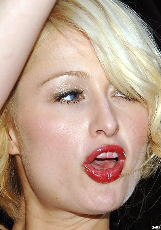 http://www.judiciaryreport.com/images/paris-hilton-lipstick-on-teeth.jpg