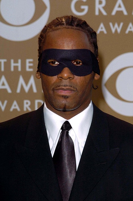 R. Kelly’s lawyer contends he is not the man in a video having se...